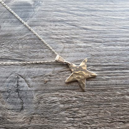 Small hammered star pendant