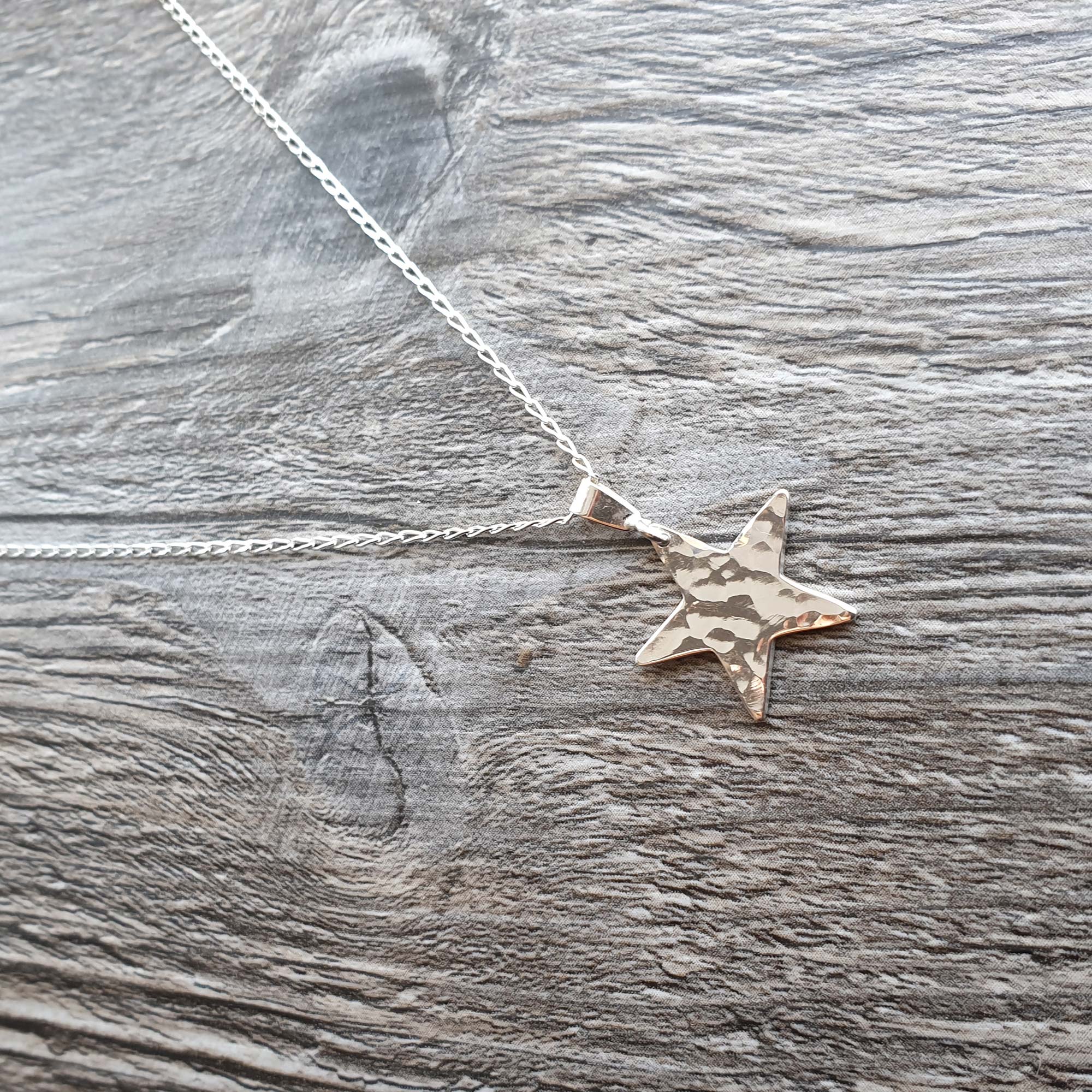 Small hammered star pendant